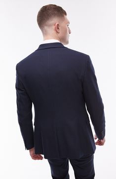 A lightly textured weave distinguishes this suit jacket tailored in a smart skinny fit and framed with handsome notched lapels. 30" length (size 42R) Notched lapels Chest welt pocket; front flap pockets Nonfunctional four-button cuffs Lined 64% polyester, 34% viscose, 2% elastane Dry clean Imported Business Blazer With Single Button And Notched Shape, Notched Single-button Blazer For Business, Notch Lapel Sport Coat With Hidden Button For Office, Office Sport Coat With Notch Lapel And Hidden Buttons, Tailored Single Breasted Sport Coat For Semi-formal Occasions, Blue Notch Lapel Professional Blazer, Timeless Notch Lapel Tweed Jacket For Business, Business Casual Blazer With Notch Lapel, Professional Blue Notch Lapel Blazer