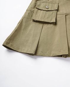 Details: Cargo pleated skirt with belt and pockets designSkirt Length: ShortMaterials:95% Polyester + 5% Spandex Casual Flared Mini Skirt With Pockets, Casual Pleated Skort For Work, Casual Pleated Waist Skort For Work, Cotton Tennis Skirt With Pockets, Casual Belted Skort For Work, Casual High Waist Skirt With Pleated Waist, Casual High Waist Pleated Skirt, Casual Fitted Pleated Skirt With Pockets, Casual Belted Pleated Skirt For Work