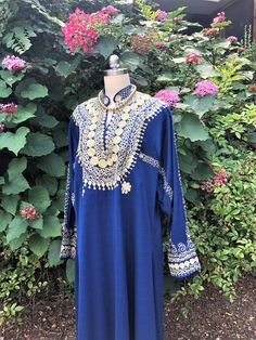 "Thank You If You Favored One of My Items! You Will Receive 10% Off an Item of Your Choice, Unless It Is on Sale, CODE17. Thank You 80's DRESSY MUMU/80's Vintage Kaftan/Vintage Abaya/80's Blue Abaya/Vintage Caftan Dress/Vintage MuMu Dress/Abaya Kaftan/ MINT Condition Circa DRESS MUMU in Royal Blue with Gold Embroidery You Are Currently Viewing a Beautiful Vintage 1980's Blue long Sleeve MuMu Kaftan Abaya Dress. This Dress Features Beautiful Gold Embroidery that is Around the Front and Back Yoke, Blue Bohemian Kurta With Traditional Drape, Festive Dabka Tunic, Blue Bohemian Kaftan With Traditional Drape, Blue Tunic Kurta With Resham Embroidery, Blue Resham Embroidered Tunic Kurta, Blue Kaftan For Traditional Ceremonies, Dabka Embroidered Tunic Kaftan For Festivals, Blue Dabka Work Kaftan For Festivals, Blue Bollywood Style Abaya For Eid