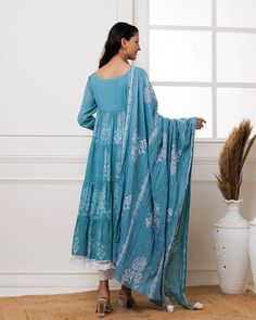 Beat the heat with effortless style in our Light Blue Hand Block Printed Anarkali Set. Made with the finest mul-mul fabric, this suit set is perfect for making a fashion statement even in soaring temperatures. Stay cool and chic even in heat. No. of pieces - 3 piece set. Color - Light Blue. Fabric - Mul-Mul. Washing Instructions - Dry Clean. Anarkali Style Cotton Palazzo Set With Self Design, Semi-stitched Cotton Blue Palazzo Set, Blue Semi-stitched Cotton Palazzo Set, Cotton Blue Dupatta With Dabka, Blue Block Print Straight Kurta Lawn Suit, Blue Cotton Palazzo Set With Dupatta, Blue Block Print Lawn Suit With Straight Kurta, Blue Maxi Salwar Kameez With Chikankari Embroidery, Blue Chikankari Embroidery Maxi Salwar Kameez