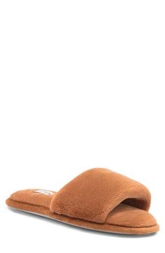 Upgrade your evening routine with these supersoft faux-fur slippers with a soft sole that's meant to be cozy indoors. Textile upper and lining/rubber sole with 100% polyester faux fur Hand wash, line dry Imported Cozy Soft Synthetic Slippers, Indoor Slippers With Faux Fur Lining, Cozy Faux Fur Slippers With Cushioned Footbed, Comfy Faux Fur Slippers Super Soft, Comfy Super Soft Faux Fur Slippers, Comfortable Faux Fur Flat Slippers, Indoor Slippers With Faux Fur Lining And Synthetic Material, Comfortable Flat Faux Fur Slippers, Super Soft Brown Indoor Slippers