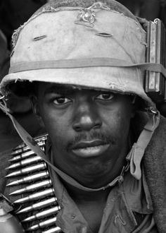 a black and white photo of a soldier