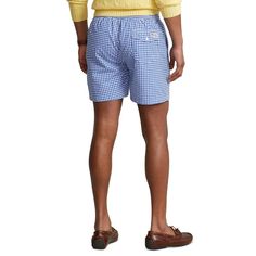 Finished with our signature embroidered Pony, these mesh-lined swim trunks deliver polished Polo Ralph Lauren style—in or out of the water..Approx. model height is 6'1' and he is wearing a size medium.Approx. inseam: 5-¾'; 10' rise.Classic Fit.Elastic drawstring waistband.Side on-seam pockets.Back right buttoned pocket.Woven 'Polo Ralph Lauren Swimwear' label at the back pocket.Mesh brief for additional support.Signature embroidered Pony at the left hem.Shell and brief: polyester.Machine washabl Summer Swimwear With Built-in Shorts In Nylon, Casual Relaxed Fit Swim Trunks For Pool, Fitted Swim Trunks For Poolside And Beach Season, Casual Swim Trunks For Warm Weather, Casual Bottoms With Short Inseam For Poolside, Casual Swim Trunks For Warm Weather Swimming, Casual Swim Trunks For Swimming, Beachwear Bottoms With Short Inseam For Beach Season, Summer Short Length Swim Trunks For Pool