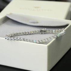 SKU : LUXB122889 This Sterling Silver Bracelet Cubic Zirconia Marquise CZ Stone Tennis Bracelet, 7.25 Inch is a meticulously crafted and beautiful bracelet. Specifications Metal color: 925 Sterling Silver Stone Color: Clear Stone Shape: Marquise Bracelet Length: 7.5 " Material: 925 Sterling Silver Our stones are the highest quality diamond simulants that are polished, finely cut, loupe clean, and have an exactly similar appearance and as beautiful as to naturally occurring diamonds. All cubic zi Elegant Cubic Zirconia Crystal Bracelet With Diamond Cut, Elegant Diamond Cut Cubic Zirconia Crystal Bracelet, Elegant Cubic Zirconia Bracelet With Diamond Cut, Silver Marquise Tennis Bracelet Fine Jewelry, Silver Marquise Jubilee Tennis Bracelet, Exquisite Diamond Cut Bracelets As A Gift, Sterling Silver Bracelet With Sparkling Stones, Exquisite Wedding Tennis Bracelet With Cubic Zirconia, Elegant Marquise Tennis Bracelet For Anniversary