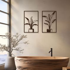 a wooden bathtub sitting next to a window with plants in the vase on it