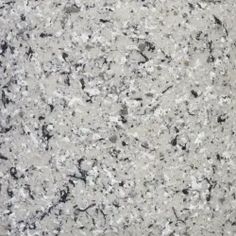 a close up view of the surface of a granite countertop with black and white speckles