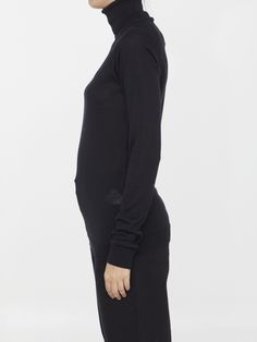 Vas turtleneck crafted from black wool,silk and cashmere with knitted design. Slim fit. The model is 180cm tall and wears size S. Size nationality: US Product number: 2656781 Product code: ARMTMKN04WS02002 Composition: 70% virgin wool, 20% silk, 10% cashmere Knitted Design, Platform Wedge Heels, Loafer Sneakers, Premium Brands, Dress With Cardigan, Clothes Collection, Cardigan Jacket, Black Wool, Versace