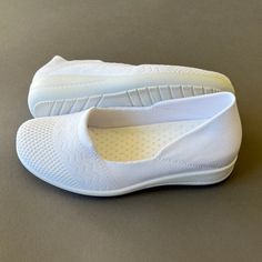 White Temple Shoes, Slip-on Walking Shoes For Light Exercise, Comfortable White Slip-ons With Flat Heel, Comfortable White Slip-ons With Cushioned Footbed, Comfortable White Slip-on Sneakers For Light Sports, Comfortable White Flat Heel Slip-ons, White Synthetic Closed Toe Slip-ons, White Flat Heel Slip-on Sneakers, White Non-slip Flat Heel Sneakers