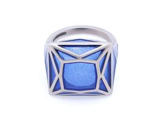 Blue plique-à-jour enamel ring in 18K white gold. Signed SA-P for Solange Azagury-Partridge, with English hallmarks. The retail price is £5800 (approximately $7500). Plique-à-jour is a difficult enameling process in which enamel is applied to an area with no backing instead of onto metal. The result is the enamel is transparent or translucent. Plique A Jour Enamel, Jewellery Marketing, Enamel Ring, Partridge, Custom Jewelry Design, Enamel Jewelry, Blue Aesthetic, Gold Design, Necklace Designs