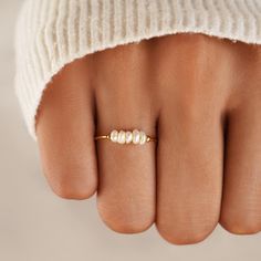 Discover the beauty of freshwater pearls with this simple and elegant ring. A unique twist to a timeless must-have, this pearl ring is like no other. Waterproof & Tarnish-Free 18K Gold plated Titanium steel Natural freshwater pearl Hypoallergenic, lead & nickel free US/Canada Ring Size UK/AU Ring Size Inside Diameter (mm) 5 J 15.7mm 6 L 16.6mm 7 N 17.2mm 8 P 18.1mm 9 R 19.1mm 10 T 19.7mm If you aren't in LOVE with your purchase, please let us know within 30 days of receiving your item, and you'l Rings Beautiful, Gold Gallery, Freshwater Pearl Ring, Jewelry Lookbook, Elegant Ring, Girly Jewelry, Bead Jewellery, Finger Ring, Jewelry Inspo