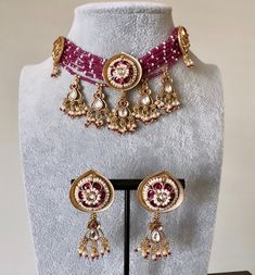 Beautiful Gold Ruby Pearl  Choker Necklace!! Handcrafted pair of earrings. Gives a traditional look. Can be worn for engagement and wedding parties.   Indulge in it or gift it and watch the compliments flow! Earrings length: 1.5 inch Width: .5 inch It is advisable to store jewelry in a zip lock pouch (air tight pouch), keep away from water perfume and other chemicals and clean it with soft cloth. FREE SHIPPING!! Bollywood Style Festive Jewelry Sets With Latkans, Bollywood Kundan Jewelry Sets With Latkans, Traditional Kundan Necklace With Meenakari For Party, Traditional Kundan Meenakari Necklace For Party, Bollywood Jewelry Sets With Latkans For Celebration, Bollywood Style Cutdana Jewelry Sets For Festivals, Heavy Bollywood Jewelry Sets For Festive Occasions, Gota Work Jewelry Sets For Festivals And Parties, Bollywood Style Heavy Jewelry Sets For Festive Occasions