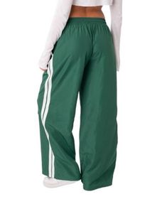 Edikted Fauna Nylon Track Pants Green Nylon Parachute Pants For Streetwear, Full-length Nylon Athleisure Pants, Full Length Nylon Athleisure Pants, Green Nylon Sports Pants, Green Nylon Sport Pants, Green Sporty Parachute Pants, Sporty Green Full-length Parachute Pants, Sporty Stretch Wide-leg Parachute Pants, Green Nylon Sporty Parachute Pants