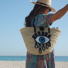 These Beautiful Moroccan Straw handbags are handwoven from natural palm leaves by handicrafts-artisans are the perfect companion to go to the beach, or swimming pool or just for shopping or to take a walk and spend a great time with friends, family, or with yourself. The interior of the straw handbag is fully lined in different colorful fabrics, that we have chosen carefully to match with the whole tote, it also includes a small pocket that can be used to carry your phone. The short handles are Straw Beach Bags, Moroccan Basket, Tote Beach Bag, Handmade Handbag, Straw Beach Bag, Straw Handbags, Handmade Handbags, Beach Bags, Leather Handles