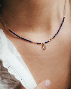 Our lapis lazuli gold choker with tiny lapis lazuli beads, labradorite and blue topaz pendant and gold accents. Ideal to wear in summer, this navy blue necklace looks amazing with its matching bracelet and in any summer event, next to the beach and lighted by the sun. This gold necklace with small blue gemstone beads is perfect as a September or December birthstone gift, when the lapis lazuli crystal takes on even more significance.  ** D E T A I L S ** Gemstones size we use are lapis lazuli and labradorite 2mm beads and blue topaz pendant 7mm. Materials: lapis lazuli, labradorite and blue topaz gemstones, 18k gold plated chain and gold plated extender.  Gemstones we use in our necklaces may have some slight variation of tone. Every natural stone is special and unique, that's the idea! ** Elegant Labradorite Beaded Necklace Gift, Elegant Labradorite Beaded Necklace For Gift, Silver Jewelry With Faceted Beads Made Of Lapis Lazuli, Silver Jewelry With Faceted Beads In Lapis Lazuli, Gold Labradorite Gemstone Beaded Necklace, Beaded Sapphire Necklace In Lapis Lazuli, Sapphire Faceted Beads Jewelry Gift, Sapphire Beaded Lapis Lazuli Necklace, Sapphire Beaded Jewelry Gift