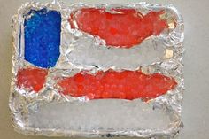 an american flag made out of tinfoil sitting on top of a white countertop