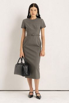 This elegant midi dress features a flattering pencil silhouette and a round neck, making it perfect for any occasion. Made from high-quality polycotton, it offers a luxurious feel and a comfortable fit. A must-have for those looking to upgrade their wardrobe with sophisticated and timeless pieces. Timeless Pieces Fashion, Pencil Dress Wedding, Pencil Dress Outfit, Working Dresses, Grace Rose, Minimal Dress, Classic Workwear, Elegant Midi Dress, Smart Dresses