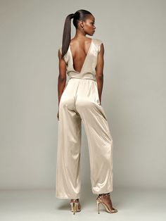 This soft satin jumpsuit features a flattering v-neck design, making it the perfect choice for mothers of the bride. Its dress pantsuit style provides comfort and elegance, while its high-quality material ensures a polished look. Stay stylish and comfortable on that special day with our jumpsuit. Dress Pantsuit, Wedding Guest Men, Mother Of The Groom Dress, Satin Jumpsuit, Dress Pant Suit, Junior Bridesmaid Dresses, Junior Bridesmaid, Mother Of The Bride Dress, Groom Dress