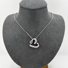 This Is An Absolutely Stunning Cubic Zirconia Heart Statement Necklace Crafted In 925 Solid Sterling Silver. The Heart Pendant Is Filled With Glistening Round Brilliant Cut White Cubic Zirconia Gemstones. It Comes With A Sterling Silver Chain That Measures 16” Long, Which Has A 2” Long Extension Chain To Adjust Length From 16”-18”. Both Pendant And Chain Are 925 Solid Italian Sterling Silver. *100% Brand New *100% Guarantee High Quality * 100% Lead And Nickel Free * 100% Hypoallergenic * Will Not Tarnish Or Fade *Smoke Free Pet Free Home - ***Free Jewelry Pouch Included*** Gift For Her Engagement Anniversary Promise Wedding Mother’s Day Graduation Vacation Mom Dad Christmas Silver Necklace With Heart Charm In Cubic Zirconia, Silver Necklaces With Heart Charm In Cubic Zirconia, Silver Charm Necklaces For Mother's Day, Silver Necklace With Cubic Zirconia Heart Charm, Silver Necklaces With Cubic Zirconia Heart Charm, Double Heart Cubic Zirconia Necklace As Gift For Her, Cubic Zirconia Double Heart Clavicle Chain, Double Heart Cubic Zirconia Necklace For Her, Double Heart Clavicle Chain With Cubic Zirconia