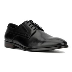 Looking to step up your office shoe game? The Elias oxford might just be what you've been searching for. Crafted from a smooth genuine leather upper, this timeless and classic style features an elegant lace-up design that exudes sharpness without being ostentatious. Perfect for adding sophistication to your professional attire, the Elias oxford ensures you look polished and refined in any office setting, making it a must-have for your wardrobe. Classic Wingtip Dress Shoes For Business Meetings, Modern Plain Toe Oxfords For Business, Classic Lace-up Business Shoes With Plain Toe, Classic Dress Shoes With Brogue Detailing For Business Meetings, Classic Plain Toe Business Lace-up Shoes, Masculine Black Oxfords For Business, Classic Leather Oxfords For Business Meetings, Classic Dress Shoes With Leather Sole For Business Meetings, Black Wingtip Leather Shoes For Business