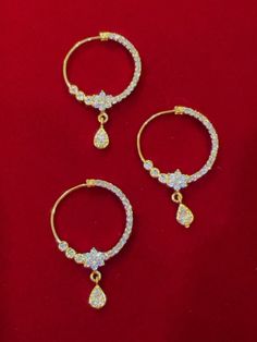 About 1 inch in diameter. Plated Round Jewelry For Weddings, Round Plated Jewelry For Wedding, Gold Hoop Alloy Jewelry, Gold Hoop Jewelry In Alloy, Gold Hoop Jewelry Made Of Alloy, Hand-set Round Gold Plated Jewelry, Silver Toe Ring Jewelry, Hand Set, Gold Alloy Ring, Gold Alloy Ring Jewelry