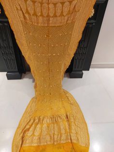 Indian translational BANDHANI Banarasi georgette dupatta.  Colour : Yellow  BANDEJ :WHITE LENGTH 2.5 MTR GOLDEN JARI PALLU BORDER Yellow Art Silk Anarkali Set With Chikankari Embroidery, Yellow Chinon Anarkali Set With Cutdana, Yellow Salwar Kameez With Chikankari Embroidery, Traditional Drape Scarves With Chikankari Embroidery For Wedding, Wedding Scarves With Chikankari Embroidery, Yellow Unstitched Chinon Traditional Wear, Unstitched Yellow Chinon Traditional Wear, Yellow Sharara With Chikankari Embroidery In Art Silk, Yellow Chikankari Embroidery Sharara In Art Silk