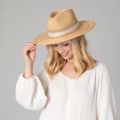 This summer, upgrade your wardrobe with the Coastal Sunset Women's Stiff Brim Fedora. Made with 100% fine raffia, this classic fedora features a chic 3.5" brim, adjustable fit and unparalleled UPF 50+ sun protection. Accented with layered grosgrain and linen bands, plus a gold chain trim, this finely-crafted piece is perfect for special occasions. Features: Color: NaturalMaterials: 100% Fine RaffiaBrim Size: 3.5" BrimSize: 57cmSun Protection: UPF 50+Adjustable Coastal Sunset, Upf 50, Sun Protection, Summer Women, Gold Chain, This Summer, Fedora, Special Occasion, Spring Summer