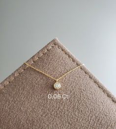 DETAILS * We never use gold plates or gold-filled metals in any of our jewelry. All the metals we use are lead-free, nickel-free, and hypoallergenic. * 0.06 ct Solitaire Pendant Width: 3 mm * 0.06 ct Solitaire Pendant Height: 3 mm * Chain Length: 18 inches * Chain Type: Dainty Cable * Clasp: Spring Ring * Ready to Ship in 1-3 Business Days * 100% US sourced * 6 Months Warranty * Free returns within 30 days from the order date DIAMOND DETAILS * Gem Stone: Genuine Diamond * Diamond-Cut: Round * Di Gold 14k Diamond Necklace With Single Diamond, Gold Solitaire Necklace With Round Cut Birthstone, Gold Solitaire Necklace With Diamond Accents For Anniversary, Gold Solitaire Necklace With Single Diamond, Everyday Gold Solitaire Necklace With Single Diamond, Everyday Gold Diamond Necklace With Bezel Setting, Gold Diamond Necklace With Single Diamond, Gold Diamond Necklace With Bezel Setting For Everyday, Gold Diamond Solitaire Necklace For Anniversary