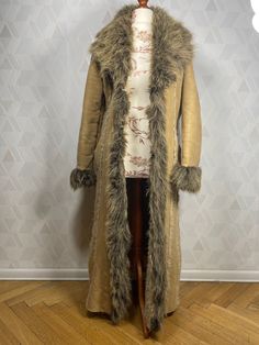 60s Fur Coat, Fitted Long Fur Coat For Winter, Winter Long Fur Coat With Faux Fur Lining, Vintage Long-sleeved Faux Fur Coat, Vintage Long Sleeve Fur Coat With Faux Fur Lining, Fitted Long Fur Coat For Cold Weather, Vintage Long Coat In Faux Fur, Long Fur Coat With Feather Trim For Winter, Long Sleeve Fur Coat With Feather Trim For Winter