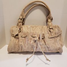 Charlie Lapson Corc Embossed Cream Handbag .New Never Used Any Tiny Flaws Are From Storing Only Measures Approx 17" X 9 1/2" Handles 10". Beige Pouch Shoulder Bag With Handle Drop, Beige Leather Shoulder Bag With Adjustable Handle, Beige Hobo Bag With Handle Drop For Daily Use, Beige Handheld Satchel In Soft Leather, Beige Soft Leather Handheld Satchel, Handheld Beige Soft Leather Satchel, Beige Rectangular Hobo Bag With Handle Drop, Rectangular Beige Hobo Bag With Handle Drop, Cream Leather Shoulder Bag With Adjustable Handle