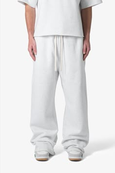 the Washed Ultra Baggy Sweatpants are designed with a baggy fit throughout, featuring an elasticized self waist, tonal cotton drawstrings, standard hem at the leg opening, and finished in both a washed and brushed fleece fabric. details baggy fit 100% cotton, 360 gsm model is 6’1, 140 lbs and wears a size medium note: this fit is intentionally baggy in waist and fit, for a more relaxed fit we recommend sizing down Affordable Baggy Sweatpants, Baggy White Sweatpants, White Baggy Sweatpants, Japanese Sweatpants, Baggy Grey Sweatpants, Baggy Sweats, Oversized Joggers, Fire Clothes, Oversized Sweatpants