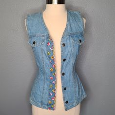 Nwt Vintage 90s Sleeveless Floral Embroidered Denim Button Down Blouse Shirt Brand: Switch Usa Size: S Floral Embroidered Design Hides Buttons Two Faux Front Pockets Made In The Usa 100% Cotton C-U-1 Spring Light Wash Fitted Denim Vest, Spring Fitted Light Wash Denim Vest, Fitted Light Wash Denim Vest For Spring, Spring Denim Blue Buttoned Vest, Summer Medium Wash Vest With Buttons, Spring Blue Denim Vest With Buttons, Blue Denim Vest With Buttons For Spring, Fitted Button-up Denim Vest For Spring, Medium Wash Button Vest For Summer