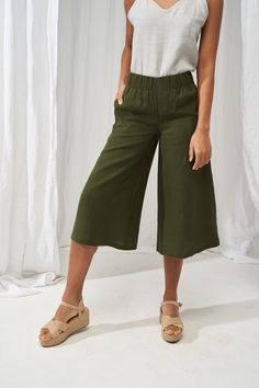 "One of the most stylish and versatile clothing pieces - wide and sweeping linen culottes. Tailored from Lithuanian softened linen fabric they make a great clothing piece for the office, effectively creates a stunning evening look as well. Design features an elastic waistband and side pockets that add a touch of elegance and comfort to even the simplest outfits. FABRIC: 100% softened Lithuanian linen COLOR: Please choose the desired color from the side menu. STYLE: Softened linen culotte pants w Green Pull-on Straight Pants, Versatile High-waisted Relaxed Fit Culottes, Versatile High-waisted Culottes With Relaxed Fit, Versatile Cropped Wide Leg Pants With Pockets, Versatile Wide Leg Cropped Pants With Pockets, Versatile Relaxed Fit Culottes With Elastic Waistband, Versatile Ankle-length Relaxed Fit Culottes, Casual Relaxed Fit Cropped Culottes, Versatile Relaxed Fit Wide-leg Culottes