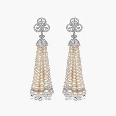 Descending from a club-inspired diamond motif, these 18K white gold earrings showcase a cascade of Freshwater pearls, elegantly graduating into a refined tassel. The Tassel earrings embody modern high-jewellery sophistication, with their intricate design and luxurious details, making them the perfect statement piece to elevate any ensemble. Pearl Size: Mixed Metal: 18K White GoldApproximate Diamond Weight: 2.79cts Luxury Diamond Dangle Pearl Earrings, Luxury Pearl Drop Diamond Earrings, Luxury High Luster Akoya Pearl Earrings, Luxury White Diamond And Akoya Pearl Earrings, Yoko London Pearl Earrings, Club Earrings, Rare Pearls, High Jewellery, Pearl Jewellery