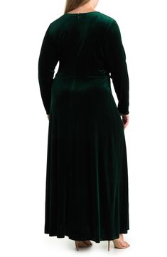 Perfect for an evening out, this long-sleeve maxi dress is crafted from soft stretch velvet for elegant style. 55" length Surplice V-neck Long sleeves Back zip closure Velvet construction Partially lined Shell: 90% polyester, 10% spandex//lining: 100% polyester Machine wash, dry flat Imported Model stats: 5'10" height, 41" bust, 36" waist, 48" hip. Model is wearing size 2X. Velvet Maxi Dress, Velvet Maxi, Stretch Velvet, Long Sleeve Maxi, Maxi Dress With Sleeves, Long Sleeve Maxi Dress, Elegant Style, Nordstrom Rack, Neck Dress