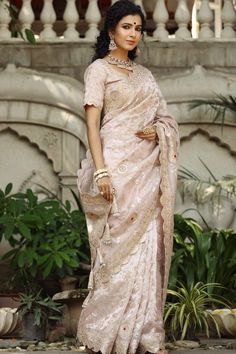 Buy stunning cream heavy embroidery tissue silk saree online in USA with saree blouse. Make a fashion statement at weddings with stunning designer sarees, embroidered sarees with blouse, wedding sarees, handloom sarees from Pure Elegance Indian fashion store in USA.-full view Wedding Pre-draped Saree With Intricate Embroidery In Tussar Silk, Wedding Blouse Piece With Chikankari Embroidery In Katan Silk, Wedding Saree With Chikankari Embroidery In Tussar Silk, Cream Embroidered Saree For Reception, Tussar Silk Saree With Chikankari Embroidery For Wedding, Bollywood Style Cream Saree With Zari Work, Cream Semi-stitched Pre-draped Saree With Zari Work, Semi-stitched Cream Pre-draped Saree With Zari Work, Embroidered Tussar Silk Saree For Reception