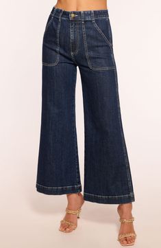 Fall for the leg-elongating silhouette of these high-waisted jeans finished in a dark-blue wash and styled with abbreviated wide legs. Zip fly with button closure Five-pocket style 98% cotton, 2% polyurethane Machine wash, line dry Made in the USA Wide Leg Ankle Jeans, Cami Nyc, Ramy Brook, Wardrobe Edit, Cropped Style, Wide Legs, Trina Turk, New Tops, Ankle Jeans