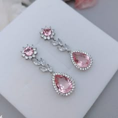 Whole set:https://www.etsy.com/listing/809424238/light-pink-crystal-bridal-jewelry-set?ref=listings_manager_grid Material: Swarovski  light rose ignite crystals(non-foil-back),  clear cubic zirconia paved findings, plated brass findings, sterling silver ear posts.  Styles: picered earrings or clip-on earrings. Size: Full length approx 4.2cm, 1.4cm wide.  Teardrop dangles are 1.6cm*1.4cm.  Metal Color: Available in Rose Gold, Yellow Gold and White Gold(silver tone). Please choose a color when you Blush Pink Earrings, Gold Wedding Earrings, Pearl Wedding Jewelry, Silver Bridal Earrings, Non Pierced Earrings, Drop Chandelier, Vestidos Color Rosa, Wedding Jewelry For Bride, Drop Earrings Silver