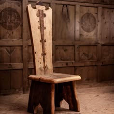 an old wooden chair sitting on top of a floor