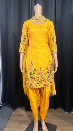 Hand embroidered yellow suit on khadar silk. Yellow Anarkali Kurta With Floral Embroidery, Yellow Silk Kurta For Eid, Yellow Semi-stitched Raw Silk Kurta, Yellow Silk Long Sleeve Kurta, Yellow Unstitched Raw Silk Kurta, Yellow Chanderi Kurta With Floral Embroidery, Bollywood Style Yellow Silk Kurta, Yellow Raw Silk Kurta With Dabka Detailing, Yellow Raw Silk Kurta With Dabka