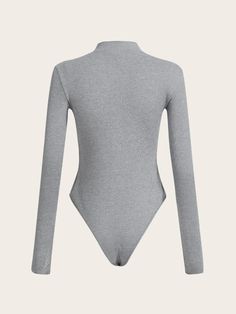 This stylish long sleeve High Cut Zipper Bodysuit is perfect for any wardrobe. Made from high-quality fabric, it features a stand collar and a zipper detail for added style. The regular sleeve construction gives a comfortable fit, while the plain pattern allows for versatile styling options. Whether you pair it with jeans for a casual look or with a skirt for a more elevated style, this top is sure to make a statement. Features: Pattern Type: Plain Neckline: Stand Collar Details: Zipper Sleeve Length: Long Sleeve Sleeve Type: Regular Sleeve Waist Line: Natural Material: Fabric Size Chart (Inches): Product Measurements Size US Bicep Length Bust Cuff Hip Size Length Shoulder Sleeve Length Waist Size XS 2 9.6 29.1 5.9 29.5 26.8 13.4 23.6 25.2 S 4 10.2 30.7 6.3 31.1 27.4 13.8 24 26.8 M 6 10.8 Seamless High Stretch Long Sleeve Bodysuit, Stretch Full-length Bodysuit, Seamless Stretch High-cut Bodysuit, Fitted Full-length Bodysuit With Thumbholes, Blue High-stretch Bodysuit With Thumbholes, Comfy Jumpsuits, Zipper Detail, High Cut, Black Bodysuit