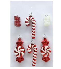 christmas ornaments and candy canes on a white background