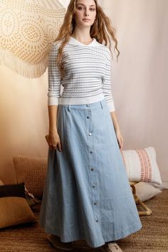 Sail into spring with MunFashion's Light Denim Button-Down Skirt. This airy, full-length skirt captures the essence of easy elegance, perfect for sunny days and cool evenings. It's the ultimate blend of relaxed comfort and polished style for the season. #SpringOutfits #MunFashion #DenimDelight #LightDenimLove #SpringFashion2024 #CasualElegance #ButtonedBeauty #DenimTrend #VersatileFashion #StyleInspiration Sailor Cardigan, Ss 2024, Classic Blouses, Charm Collection, Spring Fashion Outfits, Classy Work Outfits, Denim Trends, Nautical Fashion, Denim Button Down