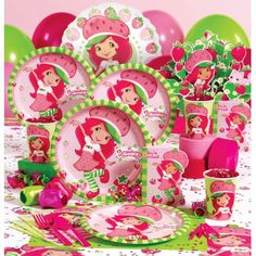 strawberry shortcake birthday party supplies including plates, napkins, cups and candy boxes