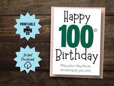 a birthday card with the words happy 100th on it and two stickers next to it