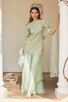 Osaa By Adarsh | Pastel Green Floral Embroidered Sharara Set | INDIASPOPUP.COM Sharara Suit Pastel Colors, Pastel Green Salwar Suit, Embroidered Raw Silk Palazzo Set With Traditional Drape, Embroidered Sharara With Straight Kurta For Reception, Embroidered Sharara For Reception With Straight Kurta, Embroidered Raw Silk Palazzo Set, Embroidered Pista Green Palazzo Set, Embroidered Raw Silk Palazzo Set For Reception, Embroidered Green Palazzo Set In Traditional Drape