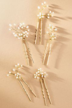 The Twigs & Honey Baby's Breath Freshwater Pearl Hair Pins beautifully combine the delicate charm of baby's breath with the elegance of freshwater pearls. | Baby's Breath Freshwater Pearl Hair Pins, Set of 5 by Twigs & Honey in Gold, Women's, Gold/Plated Brass/Freshwater Pearl at Anthropologie Pearl Bridal Comb, Pearl Comb, Bridesmaid Hair Pins, Bridesmaid Hair Accessories, Pearl Pin, Pearl Hair Pins, Pearl Hair Clip, Bridal Updo, Wedding Hair Pins