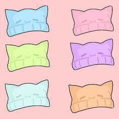 four different colored pillows on a pink background