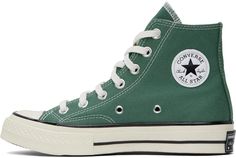 Converse.Green Chuck 70 Vintage Canvas Sneakers.High-top 12 oz canvas sneakers in green..· Rubber cap toe.· Lace-up closure.· Logo patch at inner side.· Eyelets at inner side.· Cushioned OrthoLite® footbed.· Rubberized logo patch at heel.· Treaded rubber sole.· Contrast stitching in white.Supplier color: Admiral elm green/Egret/Black.Upper: textile. Sole: rubber..Made in Viet Nam..241799F127077 Retro Green High-top Sneakers, Green Retro High-top Sneakers, Green Lace-up High-top Sneakers With Gum Sole, Green High-top Canvas Shoes With Rubber Sole, Green Cotton Sneakers With Gum Sole, Green Low-top Sneakers With Embroidered Logo, Green Cotton Sneakers With Vulcanized Sole, Green Cotton Sneakers With Rubber Sole, Green Sneakers With Embroidered Logo And Round Toe