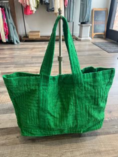 This extra large green tote bag is a spacious and stylish accessory that exudes fun and relaxation. The vibrant green color will add a pop of color to any outfit. Withe textured cloth, this piece will guarantee visual interest to any look. This tote is designed to be practical and functional, with ample room for all your essentials. Trendy Green Canvas Bag, Green Casual Canvas Shoulder Bag, Casual Green Canvas Shoulder Bag, Trendy Green Large Capacity Canvas Bag, Trendy Green Canvas Bag With Large Capacity, Trendy Green Canvas Bag For Daily Use, Trendy Green Hobo Bag For Travel, Trendy Green Hobo Bag, Trendy Green Large Capacity Beach Bag