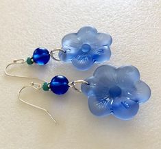 Sea Glass Flower Earrings, Blue Sea Glass Flowers, Cultured Beach Glass, Light Sapphire Blue/Royal B Blue Flower Charm Drop Earrings, Blue Flower-shaped Jewelry For The Beach, Blue Flower Jewelry For The Beach, Blue Flower Earrings Nickel Free, Blue Flower-shaped Earrings With Ear Wire, Blue Flower Earrings For Beach, Adjustable Blue Flower Earrings, Elegant Blue Czech Glass Flower Earrings, Nickel-free Blue Flower Earrings